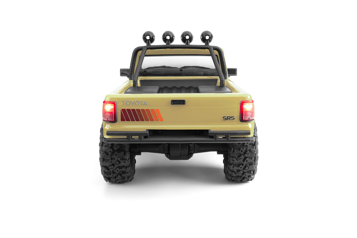 Venture18 Flux 1985 Toyota Hilux SR5 - Creme (T)