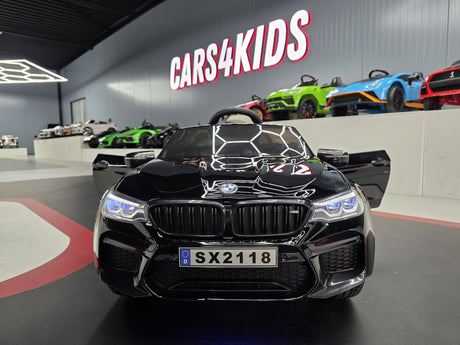 BMW M5 24 volt metallic sort børnebil