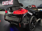 BMW M5 24 volt metallic sort børnebil