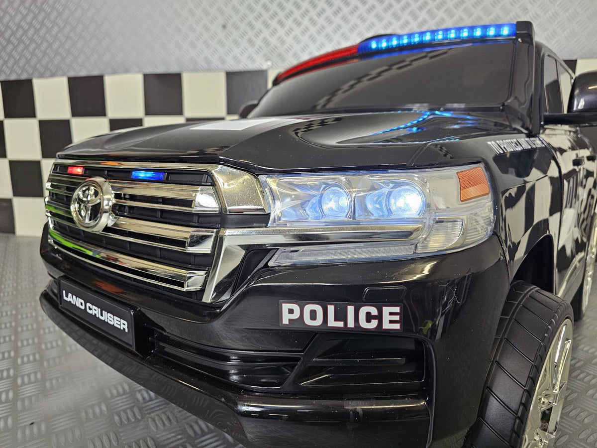 Toyota Land Cruiser polisbil 24V elbil för barn