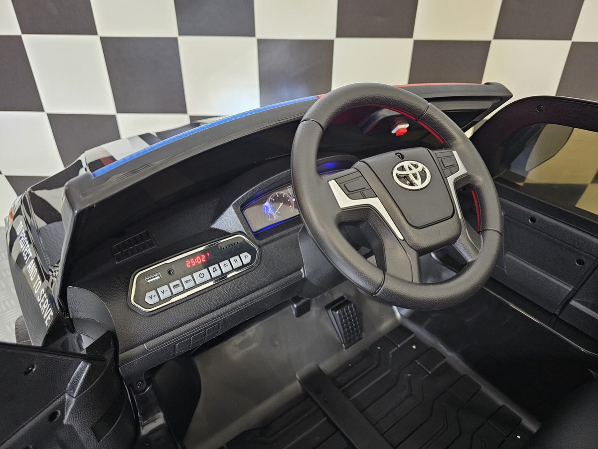 Toyota Land Cruiser polisbil 24V elbil för barn