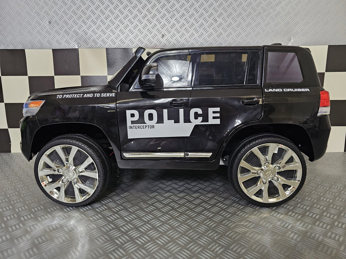 Toyota Land Cruiser polisbil 24V elbil för barn