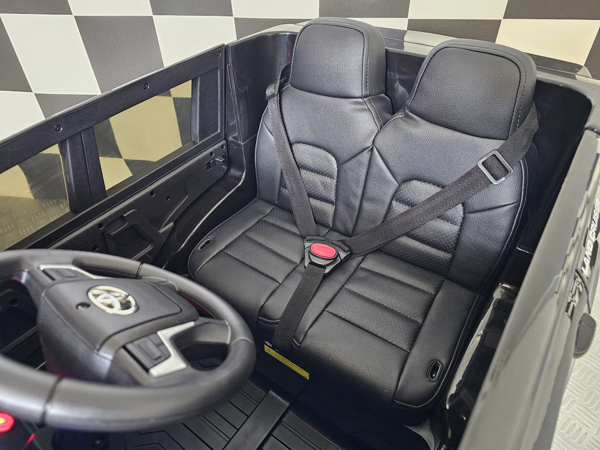 Toyota Land Cruiser polisbil 24V elbil för barn