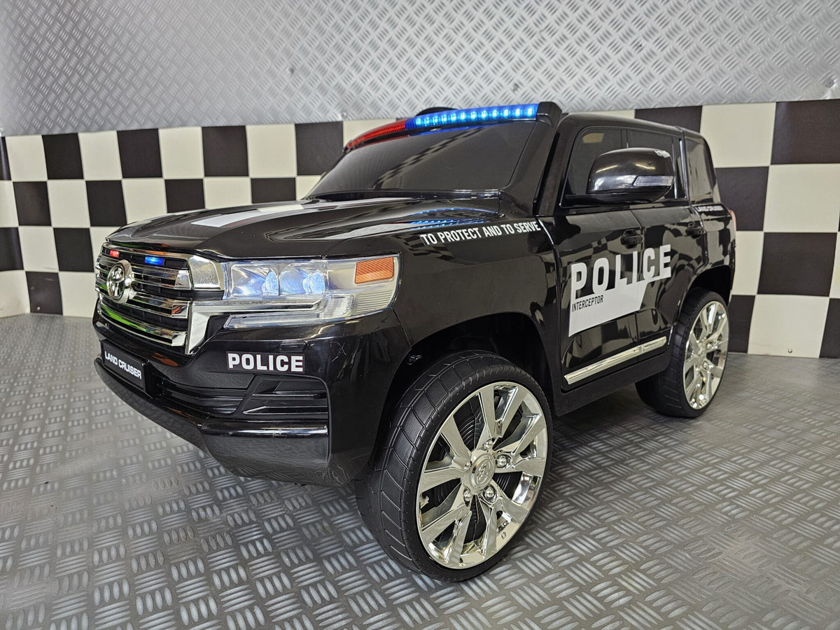 Toyota Land Cruiser polisbil 24V elbil för barn