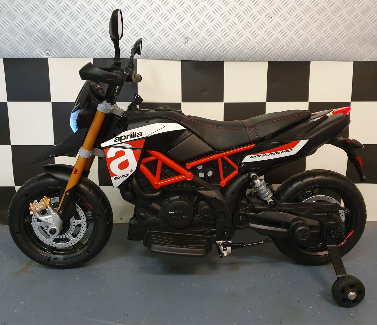 Aprilia Dorsoduro 12V elmotorcykel för barn