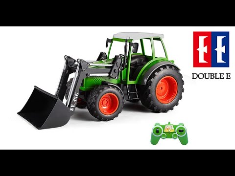 NY Stor radiostyrd traktor med frontskopa, ljus och ljud.